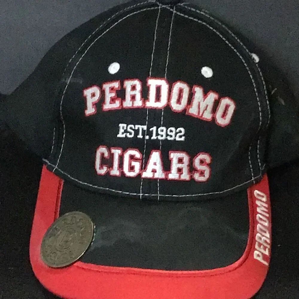 Perdomo cigar hat some wearing shown